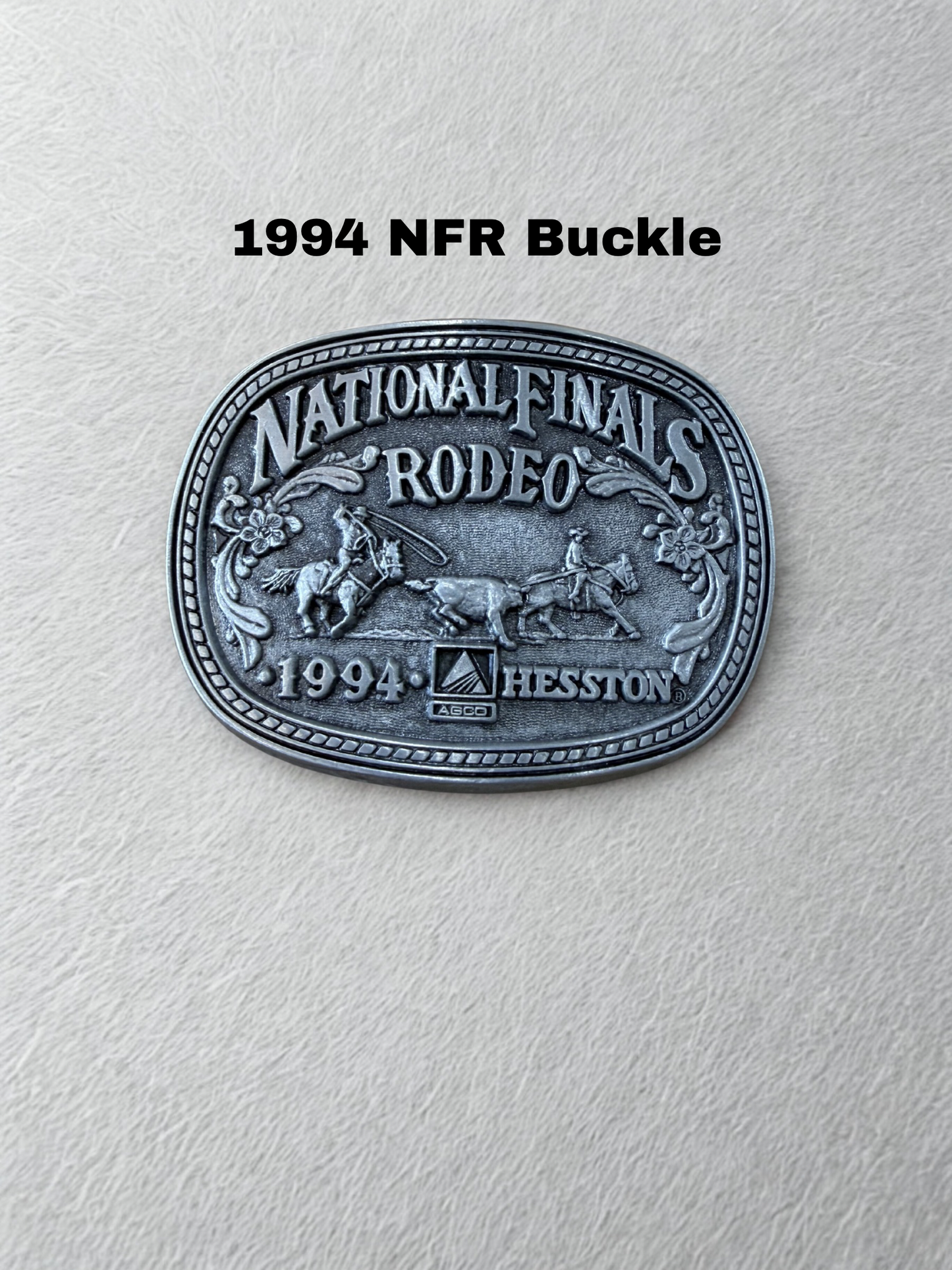 A Concho NFR belt buckle trucker hat